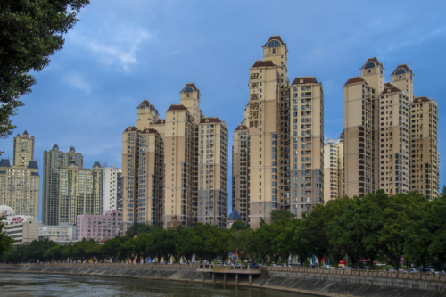 Skyscraper in Dongguan China, blue sky , Artur Rydzewski photography