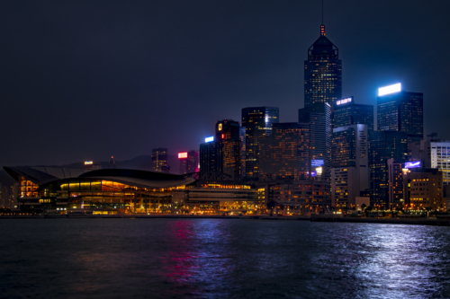 Hong Kong city by night skyscrapers, big city, water, blue sky, water reflection, Artur Rydzewski photography