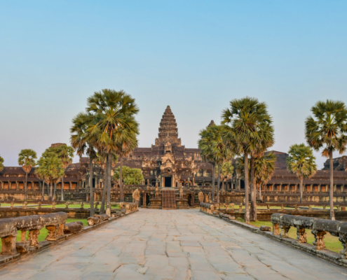 Angkor Wat Temple Cambodia old ruins trees palms long way visit trip